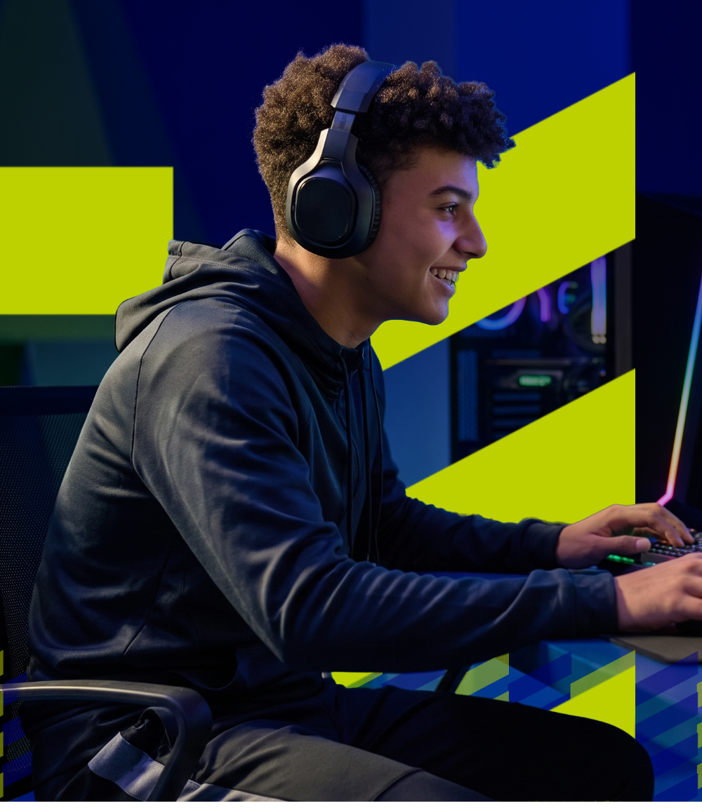 An Eastwood Global student competing at a gaming setup